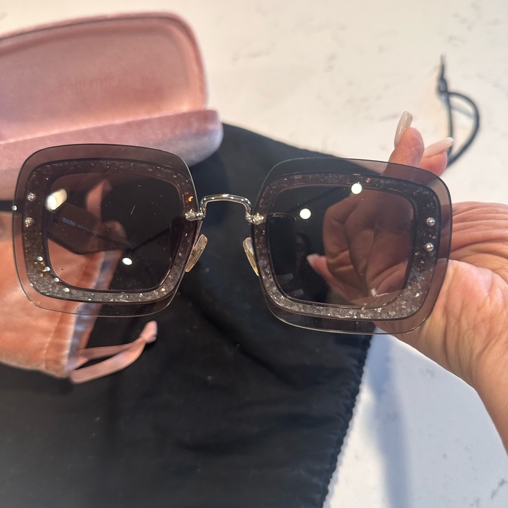 Mui Mui sunglasses. Rimless with glitter border.